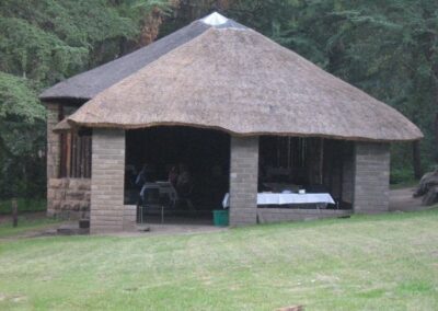 Charming Thatched-Roof Stone Cottage with Garden View