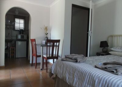 Compact Cozy Studio with Kitchenette and Dining Nook